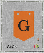 A taped needlepoint canvas with the design: Banner 13 mesh count Pointed G Black on Orange.
