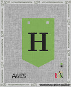 A taped needlepoint canvas with the design: Banner 13 mesh count Pointed H Black on Light Green.