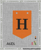 A taped needlepoint canvas with the design: Banner 13 mesh count Pointed H Black on Orange.