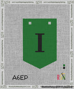 A taped needlepoint canvas with the design: Banner 13 mesh count Pointed I Black on Green.