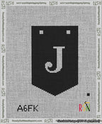 A taped needlepoint canvas with the design: Banner 13 mesh count Pointed J White on Black.
