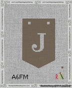 A taped needlepoint canvas with the design: Banner 13 mesh count Pointed J White on Brown.