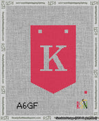 A taped needlepoint canvas with the design: Banner 13 mesh count Pointed K White on Red.