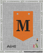 A taped needlepoint canvas with the design: Banner 13 mesh count Pointed M Black on Orange.
