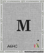 A taped needlepoint canvas with the design: Banner 13 mesh count Pointed M Black on White.