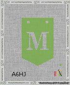 A taped needlepoint canvas with the design: Banner 13 mesh count Pointed M White on Light Green.