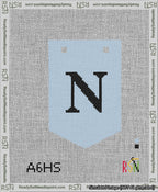 A taped needlepoint canvas with the design: Banner 13 mesh count Pointed N Black on Light Blue.