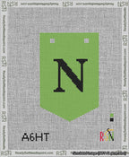 A taped needlepoint canvas with the design: Banner 13 mesh count Pointed N Black on Light Green.
