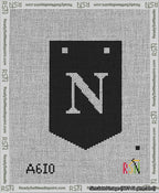 A taped needlepoint canvas with the design: Banner 13 mesh count Pointed N White on Black.