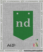 A taped needlepoint canvas with the design: Banner 13 mesh count Pointed nd White on Green.