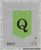 A taped needlepoint canvas with the design: Banner 13 mesh count Pointed Q Black on Light Green.