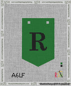 A taped needlepoint canvas with the design: Banner 13 mesh count Pointed R Black on Green.
