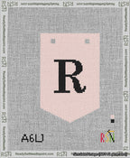 A taped needlepoint canvas with the design: Banner 13 mesh count Pointed R Black on Pink.