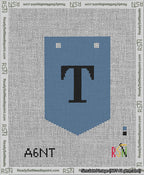A taped needlepoint canvas with the design: Banner 13 mesh count Pointed T Black on Blue.
