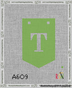 A taped needlepoint canvas with the design: Banner 13 mesh count Pointed T White on Light Green.