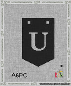 A taped needlepoint canvas with the design: Banner 13 mesh count Pointed U White on Black.