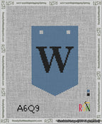 A taped needlepoint canvas with the design: Banner 13 mesh count Pointed W Black on Blue.