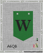 A taped needlepoint canvas with the design: Banner 13 mesh count Pointed W Black on Green.