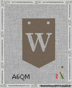 A taped needlepoint canvas with the design: Banner 13 mesh count Pointed W White on Brown.