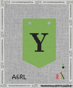 A taped needlepoint canvas with the design: Banner 13 mesh count Pointed Y Black on Light Green.