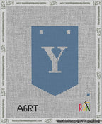 A taped needlepoint canvas with the design: Banner 13 mesh count Pointed Y White on Blue.