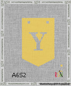A taped needlepoint canvas with the design: Banner 13 mesh count Pointed Y White on Yellow.