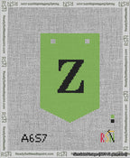 A taped needlepoint canvas with the design: Banner 13 mesh count Pointed Z Black on Light Green.