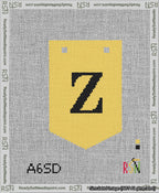 A taped needlepoint canvas with the design: Banner 13 mesh count Pointed Z Black on Yellow.