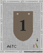 A taped needlepoint canvas with the design: Banner 13 mesh count Rounded 1 Black on Brown.