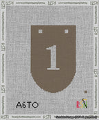 A taped needlepoint canvas with the design: Banner 13 mesh count Rounded 1 White on Brown.