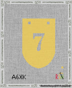 A taped needlepoint canvas with the design: Banner 13 mesh count Rounded 7 White on Yellow.