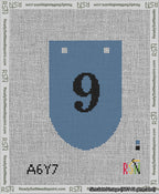 A taped needlepoint canvas with the design: Banner 13 mesh count Rounded 9 Black on Blue.