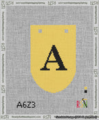 A taped needlepoint canvas with the design: Banner 13 mesh count Rounded A Black on Yellow.