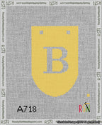 A taped needlepoint canvas with the design: Banner 13 mesh count Rounded B White on Yellow.