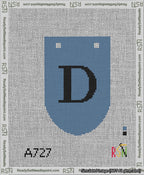 A taped needlepoint canvas with the design: Banner 13 mesh count Rounded D Black on Blue.
