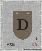 A taped needlepoint canvas with the design: Banner 13 mesh count Rounded D Black on Brown.