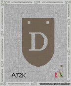 A taped needlepoint canvas with the design: Banner 13 mesh count Rounded D White on Brown.