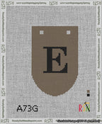 A taped needlepoint canvas with the design: Banner 13 mesh count Rounded E Black on Brown.