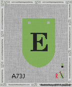A taped needlepoint canvas with the design: Banner 13 mesh count Rounded E Black on Light Green.