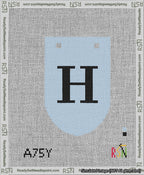 A taped needlepoint canvas with the design: Banner 13 mesh count Rounded H Black on Light Blue.