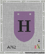 A taped needlepoint canvas with the design: Banner 13 mesh count Rounded H Black on Purple.