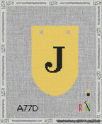 A taped needlepoint canvas with the design: Banner 13 mesh count Rounded J Black on Yellow.
