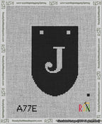 A taped needlepoint canvas with the design: Banner 13 mesh count Rounded J White on Black.