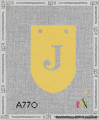 A taped needlepoint canvas with the design: Banner 13 mesh count Rounded J White on Yellow.