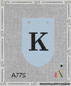 A taped needlepoint canvas with the design: Banner 13 mesh count Rounded K Black on Light Blue.
