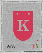 A taped needlepoint canvas with the design: Banner 13 mesh count Rounded K White on Red.