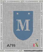 A taped needlepoint canvas with the design: Banner 13 mesh count Rounded M White on Blue.