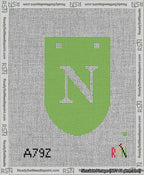 A taped needlepoint canvas with the design: Banner 13 mesh count Rounded N White on Light Green.