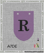 A taped needlepoint canvas with the design: Banner 13 mesh count Rounded R Black on Purple.