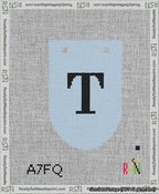 A taped needlepoint canvas with the design: Banner 13 mesh count Rounded T Black on Light Blue.